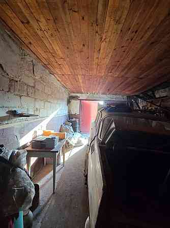 Гараж в Буденовском р-не. кооп. Горняк , все что на фото, в т.ч. автомобиль "Москвич" Donetsk